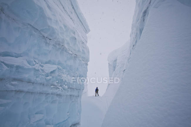 Male backcountry skier skiing through glacier, Icefall Lodge, Golden, British Columbia, Canada — Stock Photo