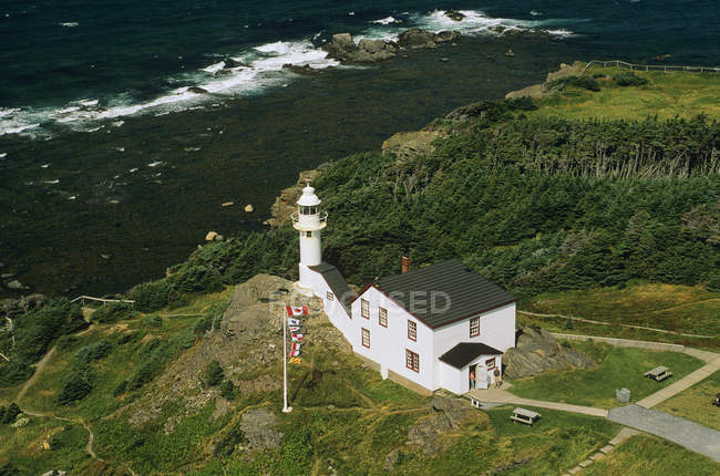 Aerial view of lighthouse on Lobster Point of Newfoundland, Canada. — Stock Photo