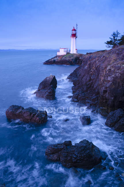 Sheringham Point lighthouse in twilight on dusk at Shirley, British Columbia, Canada — Stock Photo