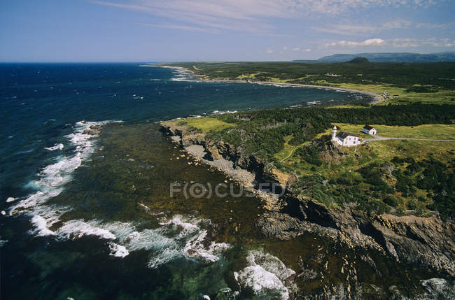 Aerial view of lighthouse on Lobster Point of Newfoundland, Canada. — Stock Photo