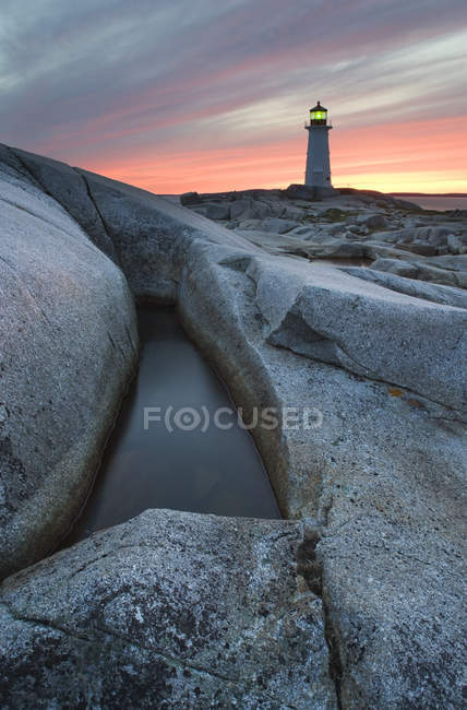Lighthouse of Peggy Cove at dusk in Nova Scotia, Canada. — Stock Photo