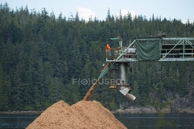 Chip loading construction in Beaver Cove, British Columbia, Canada — Stock Photo