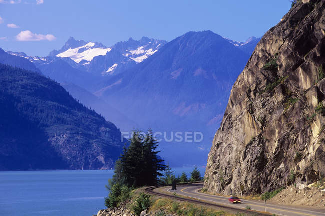 Sea to Sky Highway and riding cars in Howe Sound and Tantalus Mountains, British Columbia, Canada. — Stock Photo