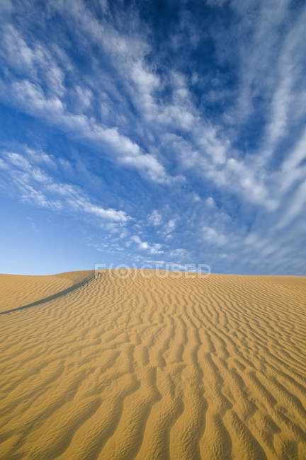 Sand dunes in Great Sandhills under cloudy sky near Sceptre, Saskatchewan, Canada. — Stock Photo