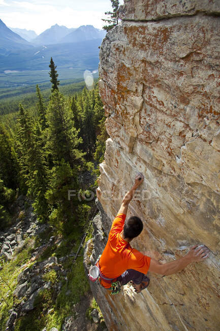 A strong male climber climbing, RUDED2 10d, Silver City, Castle Mtn, Banff, AB — Stock Photo