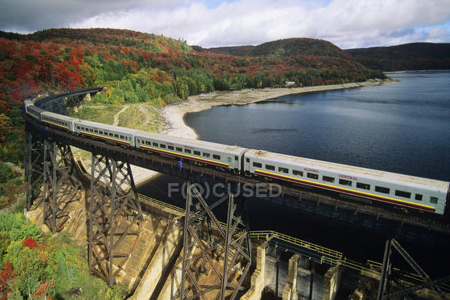 Aerial view of train riding on bridge at Agawa Canyon Wilderness Park, Ontario, Canada. — Stock Photo