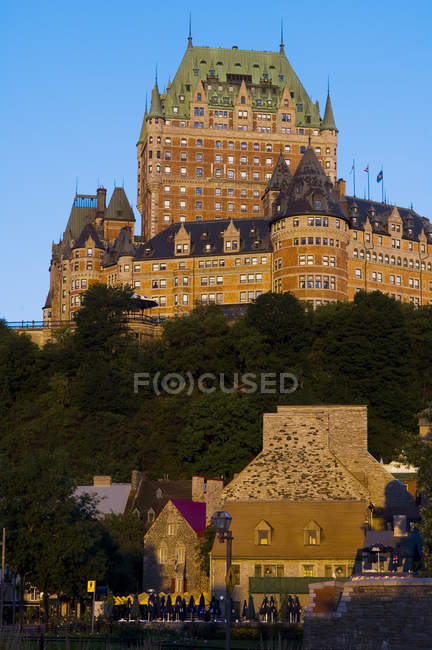 Low angle view of Chateau Frontenac in cityscape of Quebec City, Canada. — Stock Photo