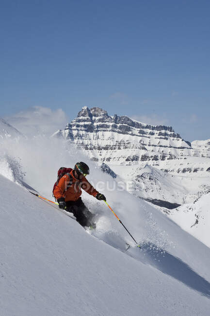Young skier riding on snow at Lake Louise Ski Area, Banff National Park, Alberta, Canada. — Stock Photo
