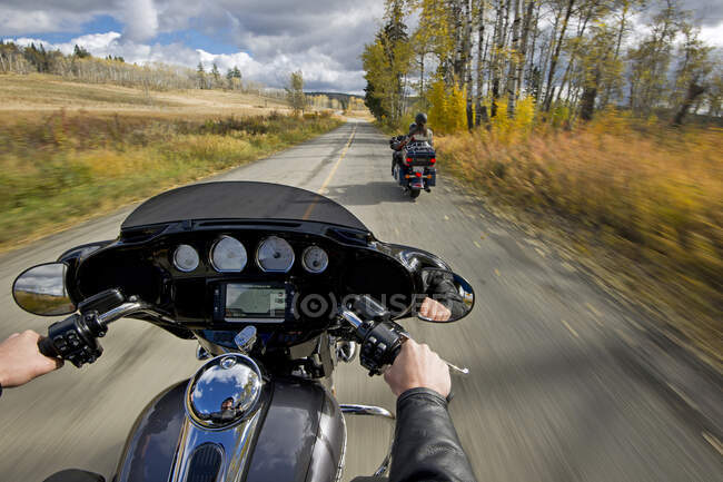 Motorcyclists ride the road to Pinantan lake, near Kamloops, in the Thompson Okanagan region of British Columbia, Canada — Stock Photo