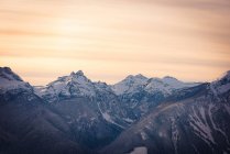 Snow covered mountains during sunset, british columbia — Stock Photo