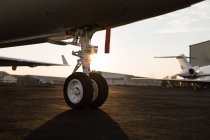 Close-up of private jet tyre at terminal — Stock Photo