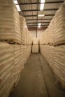 White cements arranged in warehouse — Stock Photo