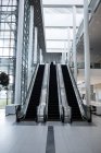 Modern escalator in the office building — Stock Photo