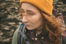 Close-up of beautiful red haired female hiker — Stock Photo