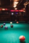 Snooker balls on snooker table in the nigh club — Stock Photo