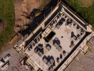 Aerial of a building under construction at the construction site — Stock Photo