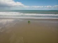 High angle view of Surfer with surfboard walking on the beach — Stock Photo