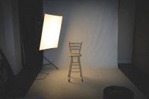 Empty photo studio with lighting equipment — Stock Photo