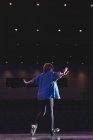 Woman dancing on stage at theatre. — Stock Photo