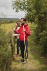 Couple standing on path near countryside — Stock Photo