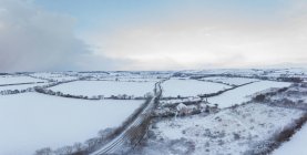 Aerial view of snowy landscape of County Cork farmland, Ireland — Stock Photo