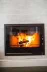 Burning fireplace at home — Stock Photo