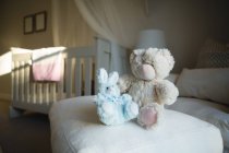 Close-up of soft toys on sofa at home — Stock Photo