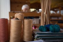Various silk thread kept in shop — Stock Photo