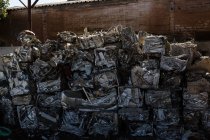 Bundles of compressed trash in the scrapyard — Stock Photo