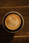Overhead view of creamy espresso on table — Stock Photo