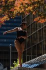 Female ballet dancer dancing in the city — Stock Photo