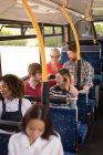 Commuter travelling in modern bus — Stock Photo