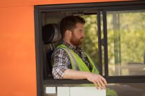 Side view of driver sitting in modern bus — Stock Photo