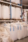 Grains in bulk bags at warehouse — Stock Photo
