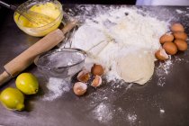 Baking ingredients on worktop in kitchen — Stock Photo