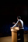 Male business executive giving a speech at conference center — Stock Photo
