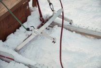 Close-up of sleigh in snow during winter — Stock Photo