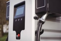 Close-up of charger at electric charging station — Stock Photo