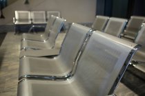 Empty seats in waiting room at the airport terminal — Stock Photo