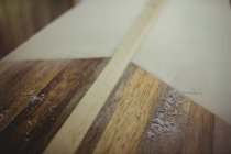 Close-up of sanded surfboard in workshop — Stock Photo