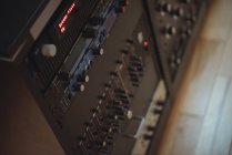 Close-up of control buttons on vintage sound mixer — Stock Photo