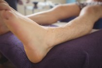 Close-up of patient getting dry needling on leg — Stock Photo
