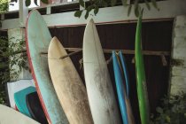 Surfboards arranged outside building — Stock Photo