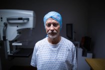 Portrait of patient in x-ray room at hospital — Stock Photo