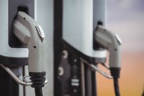Close-up of car charger at electric vehicle charging station — Stock Photo