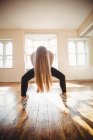 Long-haired woman practicing hip hop dance in studio — Stock Photo