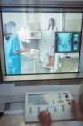 Female patient undergoing an x-ray test in the hospital — Stock Photo