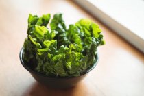Close-up of bowl of fresh lettuce — Stock Photo