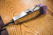 Close-up of electric trimmer on dressing table in barber shop — Stock Photo