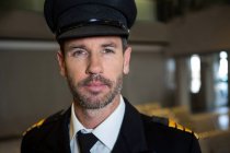 Portrait of pilot at the airport terminal — Stock Photo
